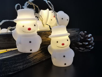 Lichterkette mit 10 Schneemann-Figuren, warm-weiß beleuchtet | batteriebetrieben