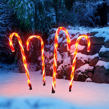 LED Gartenstecker mit 4 Zuckerstangen, beleuchtet mit je 9 warm-weißen LEDs, batteriebetrieben