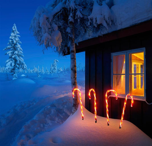LED Gartenstecker mit 4 Zuckerstangen, beleuchtet mit je 9 warm-weißen LEDs, batteriebetrieben